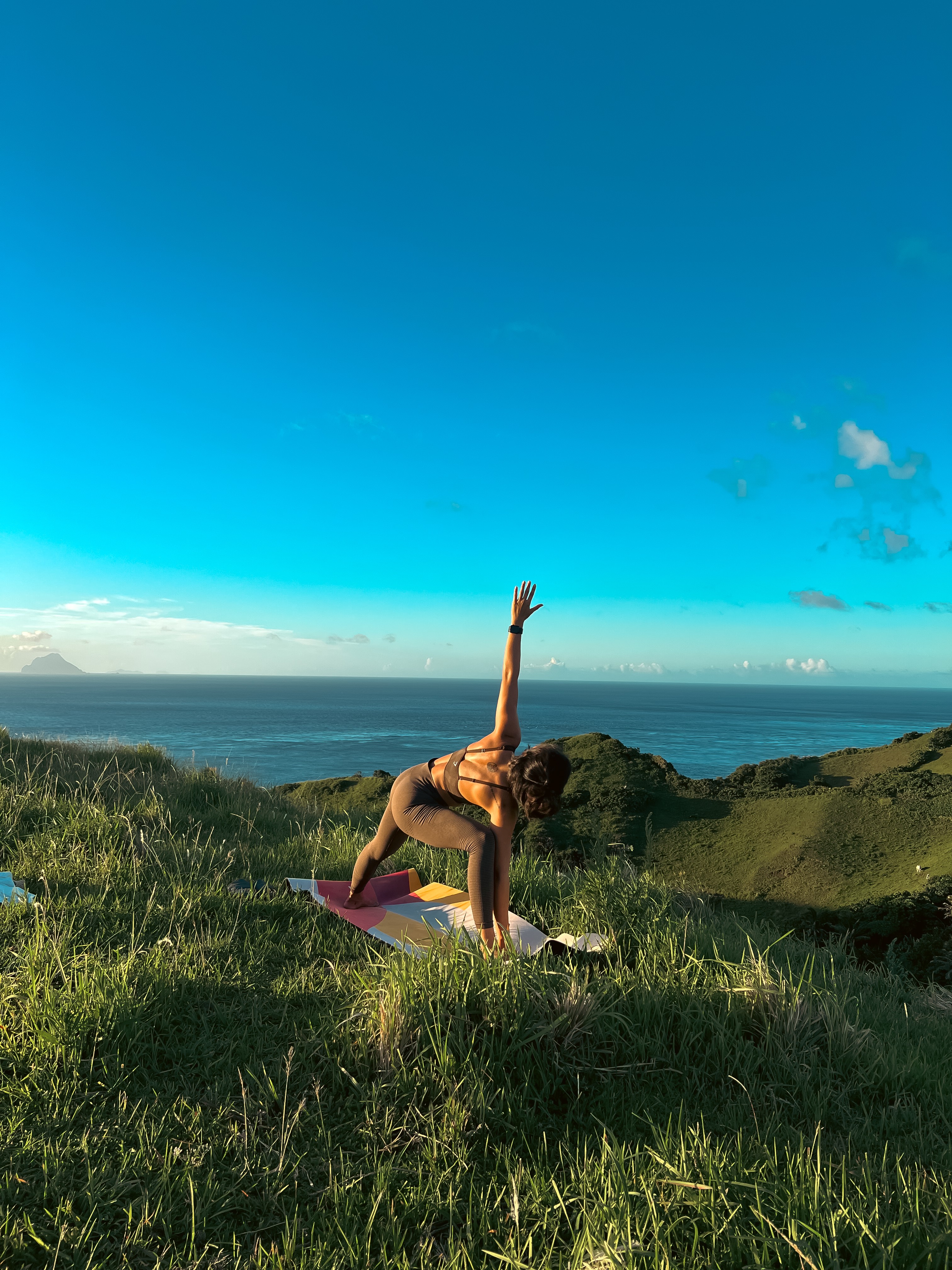 Portrait of the blog owner with face partially distorted through two clear glasses of water on a white table
